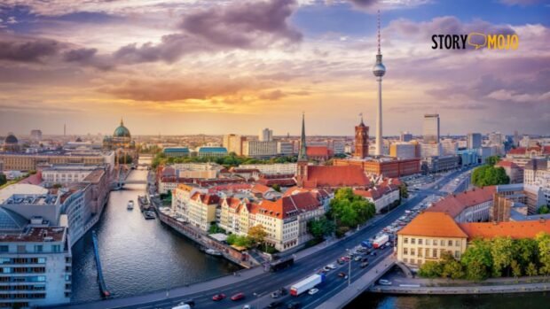 a city with a river and a tower