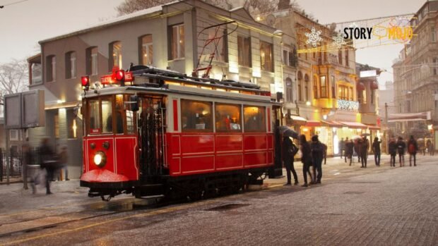 a red trolley on a street